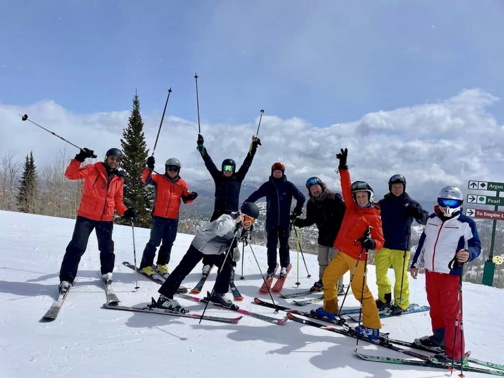 Skiers having fun on the top of the mountain